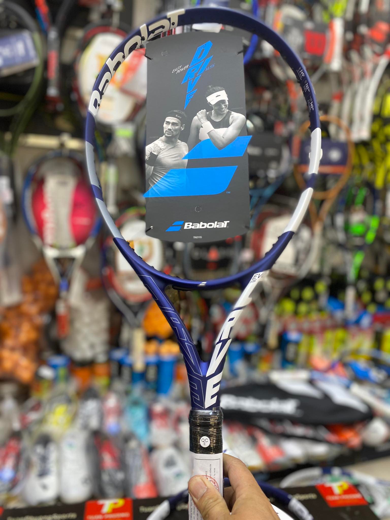 RAQUETE BABOLAT EVO DRIVE TOUR ENCORDOADA AZUL - Bottcher Tênis Shop RAQUETE BABOLAT EVO DRIVE TOUR ENCORDOADA AZUL - Bottcher Tênis Shop